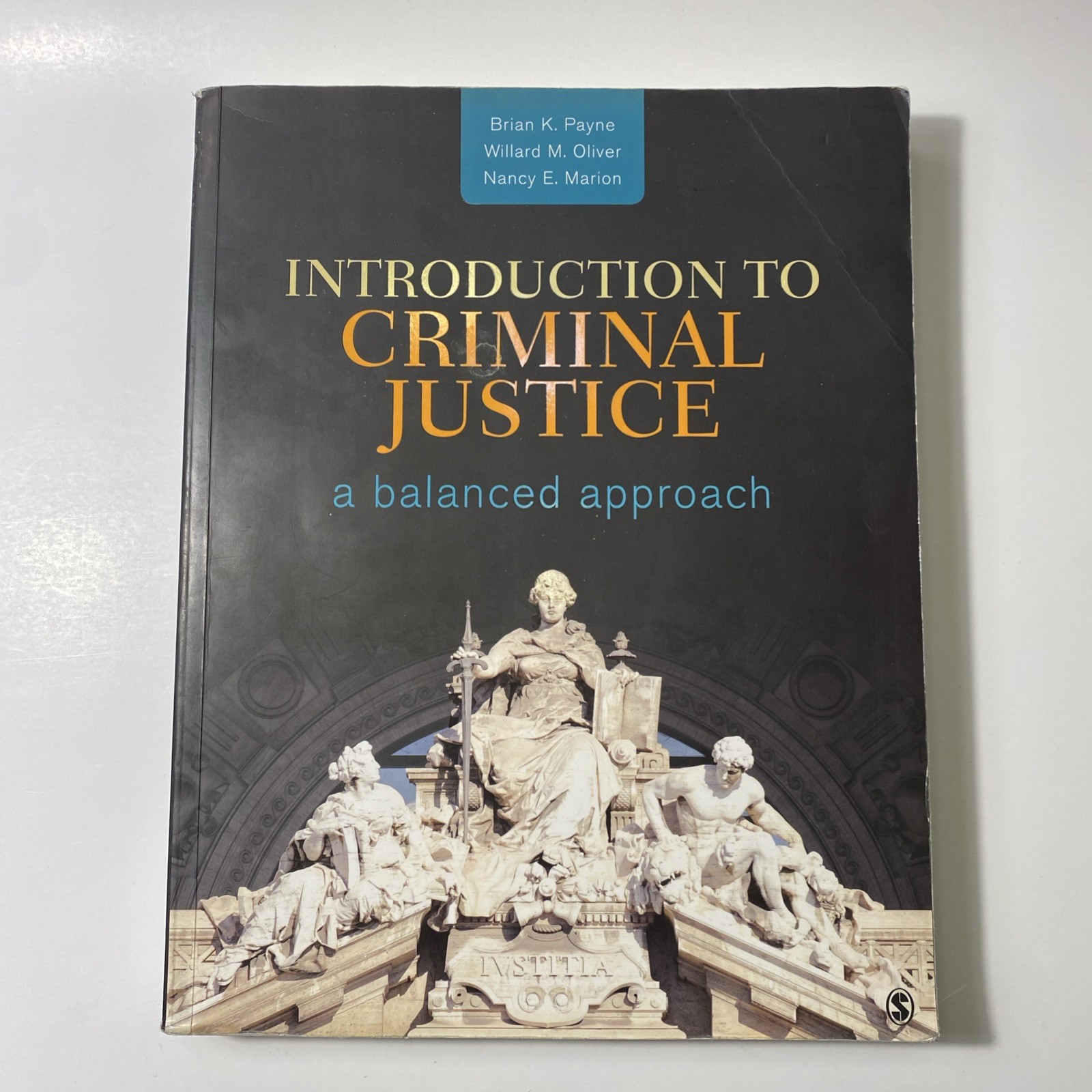 Introduction to Criminal Justice: A Balanced Approach – Paperback – GOOD