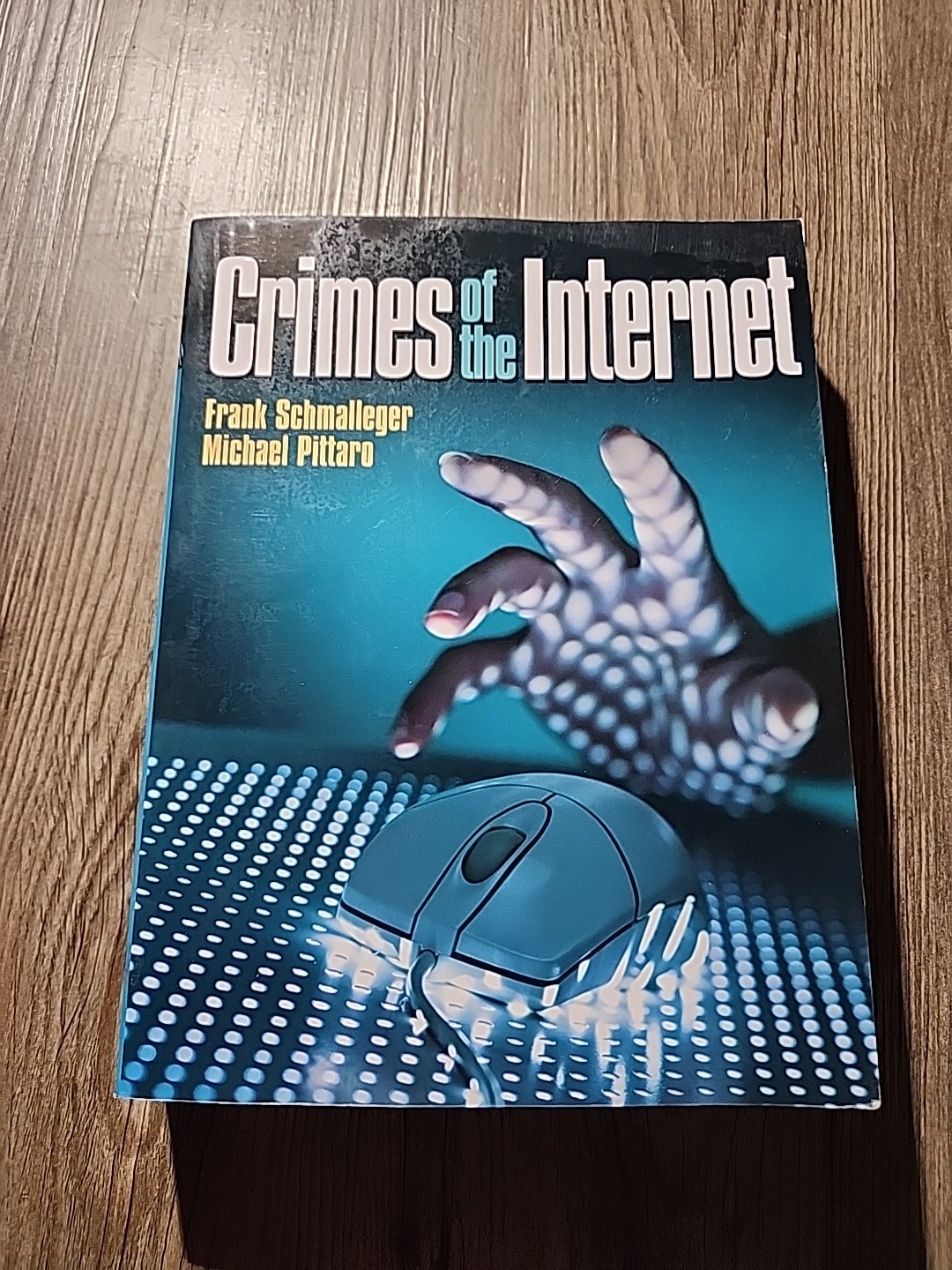 Crimes of the Internet by Frank J. Schmalleger and Michael Pittaro (2008,…