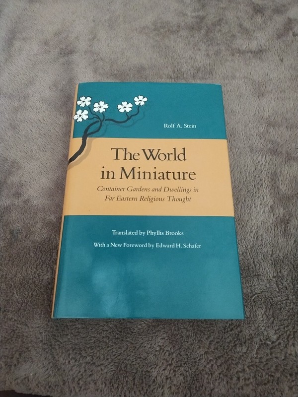 ISBN 0-8047-1674-9 BOOK THE WORLD IN MINIATURE : BY ROLF A. STEIN